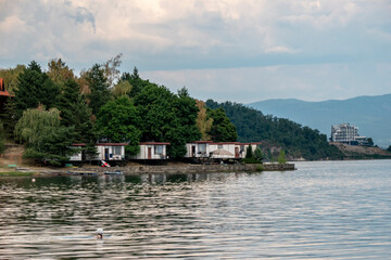 Fototapeta na wymiar Recreational area by the lake in summer