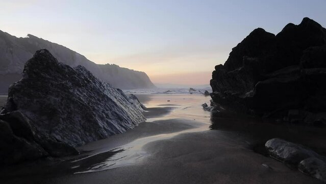 sunset on the beach of zumaia