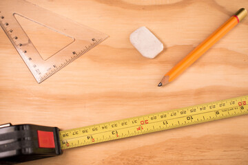 Some carpenter tools on wooden table