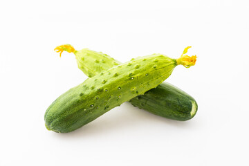 Fresh dry cucumber on pure white background