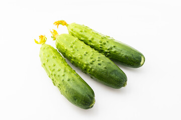 Fresh dry cucumber on pure white background