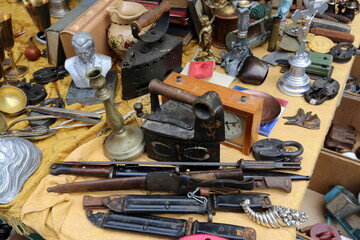 Antiques and tools are sold at the flea market