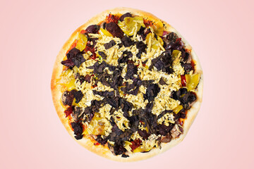 Close-up of vegan pizza with tofu and red basil isolated on pink background.