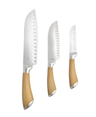 Set of three professional kitchen knives close-up isolated on white background
