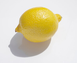 Close-Up Of Lemon Against White Background