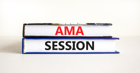 AMA ask me anything session symbol. Concept words AMA ask me anything session on books on a beautiful white table white background. Business and AMA ask me anything session concept. Copy space.