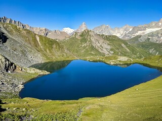 Lac de Fenêtre in Valais in Val Ferret valley and near the Great St. Bernhard. Nice view over the lake to the mountains.