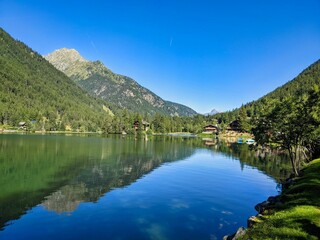Naklejka na ściany i meble lac de champex. Beautiful mountain lake above Orsières in Valais. idyllic landscape. Enjoy the silence of nature. High quality photo
