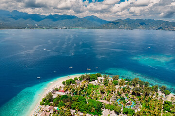 Tropical island with holiday beach and ocean, aerial view. Gili islands in Indonesia