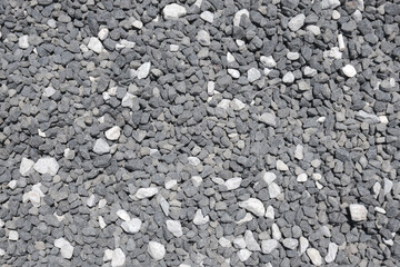 A decorative floor texture made of fragmented small natural stones