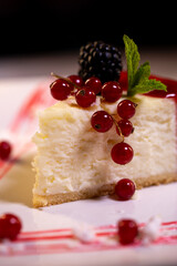 fresh delicious cheesecake close-up on a plate in a cafe
