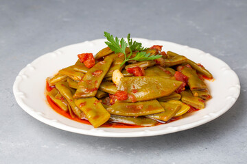 Traditional delicious Turkish food; Green beans with olive oil; Turkish name; Zeytinyagli taze fasulye