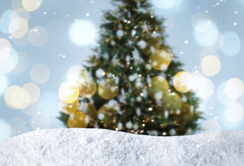Fototapeta na wymiar Beautifully decorated Christmas tree and snow on light background. Bokeh effect