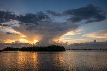 Beautiful Island Sunset with Storm Clouds Building above