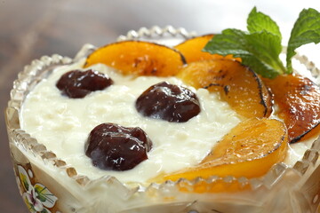Sweet Rice, dessert with milk, rice, sugar and mango pieces