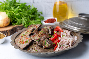 Traditional Turkish Liver kebab cuisine. Leaf Liver spicy. Delicious turkish ciger. (Turkish name; yaprak ciger)