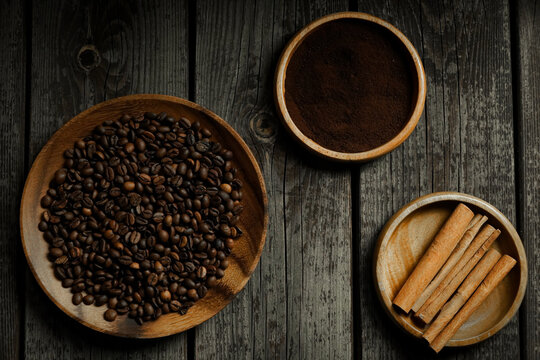 Black roasted coffee beans. Cezva cup coffee glass rustic style Turkish ground coffee © Ilya