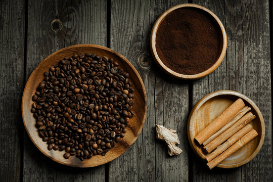 Black roasted coffee beans. Cezva cup coffee glass rustic style Turkish ground coffee © Ilya