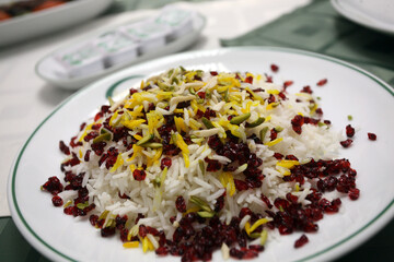 Traditional Iranian rice food on the dinner plate.