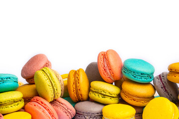 Colorful macaroon cakes. Small french muffins. Colorful macarons on a white background