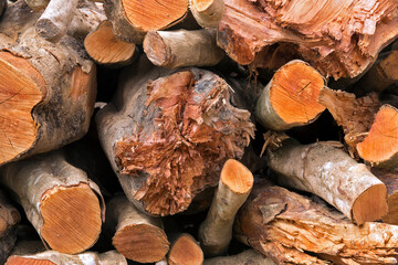 Stack of sawn timber logs to serve as firewood