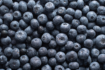 big box with scattered fresh blueberries, fresh raw food, natural healthy food