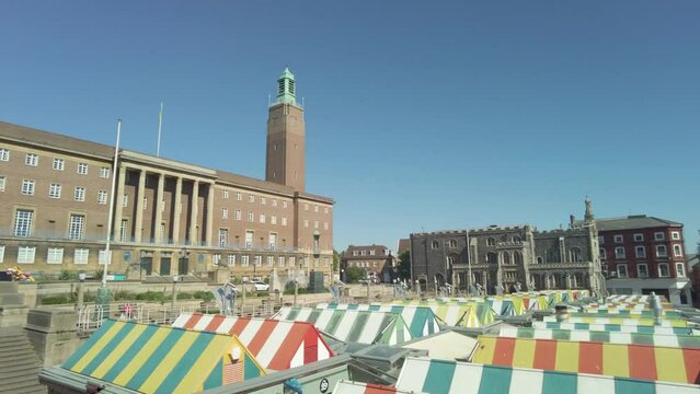 Panorama across the outdoor market in the city of Norwich, Norfolk. Captured on a bright and sunny morning