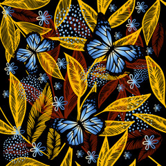 Seamless pattern of yellow leaves and blue butterflies. Vector illustration