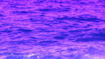 Obraz premium Sea water texture. Deep violet abstract background. Purple waves surface