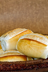 French bread basket on rustic wooden background