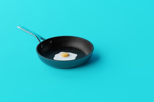 Pan with a fried egg on a blue background. The concept of preparing a dish with egg, frying an egg in a pan. 3d render, 3d illustrator