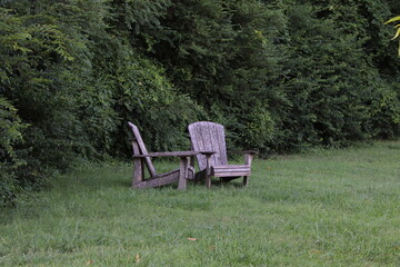 2 chairs in a grass lawn to relax in