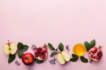 Flat lay composition with symbols jewish Rosh Hashanah holiday attributes on colored background, Rosh hashanah concept. New Year holiday Traditional. Top view with copy space