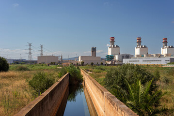 Fototapeta na wymiar landscape with a water channel heading from the power plant
