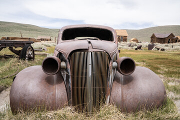 Vintage Automobiles In Bodie State Historic Park. A Well Preserved Well Protected Ghost Town Near Bridgeport, California. Worth The Visit.