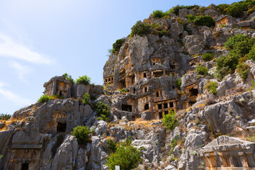 Fototapeta na wymiar Lycian rock-cut tombs carved into vertical cliffs at Myra, modern Demre, Antalya province, Turkey.