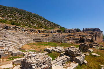 Fototapeta na wymiar Ruins of Limyra theatre. Ancient site of small city in Lycian modern Antalya Province, Turkey.