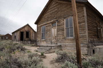 Fototapeta na wymiar Old Mining Ghost Town In Bodie State Historic Park, California. A Popular Tourist Destination Near Bridgeport.