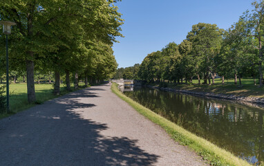 The bridge Djurgårdsbrunnsbron at the canal DJurgårdskanalen, a sunny summer day in Stockholm
