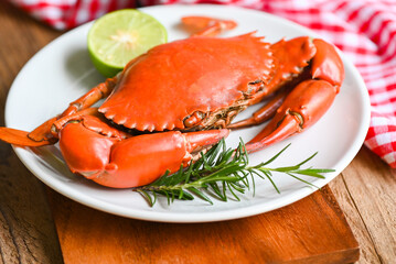 seafood crab cooking food boiled or steamed crab red in the seafood restaurant, fresh crab on white plate background