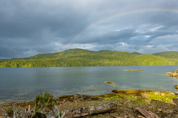 A rainbow over McLoughlin Bay where B.C. Ferries dock for the town of Bella Bella on the Inland Passage up British Columbia's Central Coast.  Room for text.