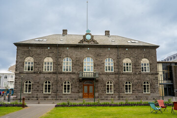 Reykjavík, Iceland - July 4, 2022 a horizontal view of the Althingi Parliament House, a classical...