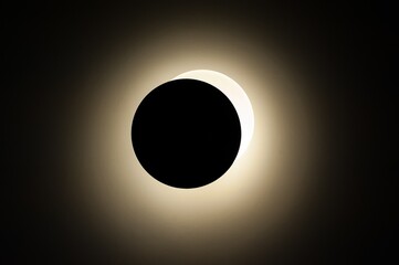 Two circles black and light on the wall