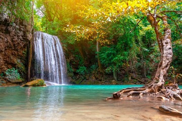 Erawan waterfall with tree rainforest colorful tones in Kanchanaburi Thailand