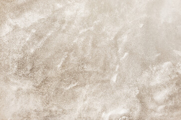 Obraz na płótnie Canvas Modern concrete texture background. Abstract champagne gold mortar cement pattern backdrop.