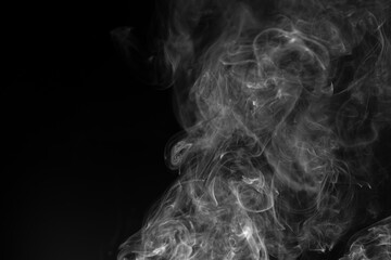 Abstract white smoke animated on a black background