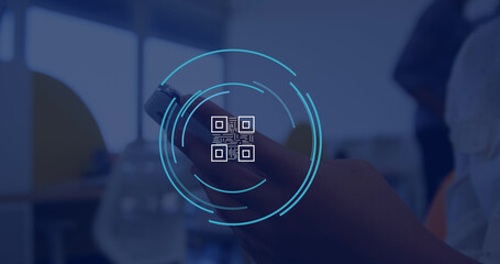 Image of qr code icon over caucasian businesswoman using smartphone in office