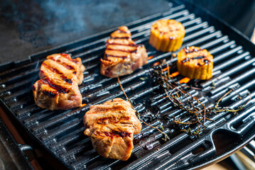 grilled pork chop and corn