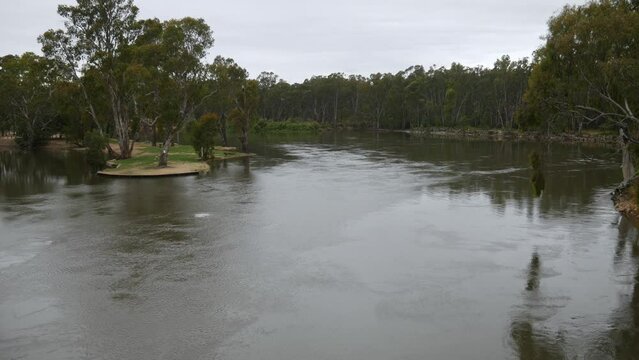 View upstream of the Murray River and Ball Park Lagoon from the John Foord Bridge between Corowa (NSW) and Wahgunyah (Victoria), Australia, November 2021.