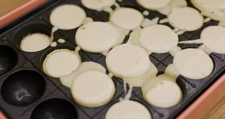 Making takoyaki, Octopus ball at home in the evening